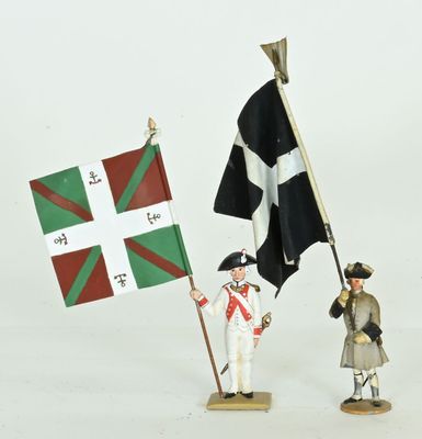 two figurines of a man holding a flag and a flag pole