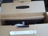 a box with a remote and a box with a remote in it