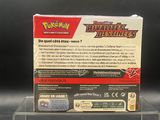 a box of pokemon trading cards sitting on a table