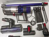a lot of different types of vacuum cleaners on the table