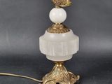 an image of a lamp that has a bird on top of it
