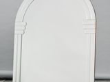 an image of a white mirror sitting on top of a tiled floor