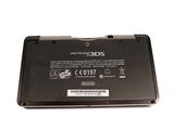 a laptop battery that is sitting on a white surface