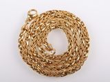 a gold chain with a clasp on a white background