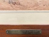 an image of a close up of a wooden drawer with a label on it