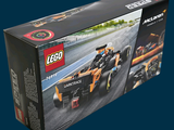 a box that has a lego race car in it