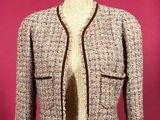 an image of a woman ' s jacket on a mannequin