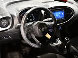 a picture of a car dashboard with a steering wheel