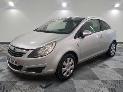 a picture of a silver car parked in a garage