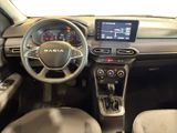 the interior of a car with a steering wheel, dashboard, and dash board