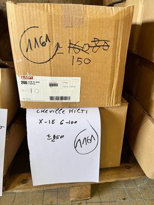 several boxes are stacked on top of each other in a room