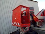 an image of a truck with a crane attached to it ' s back