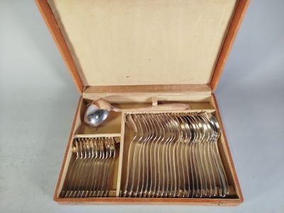 a wooden box with a set of silverware in it