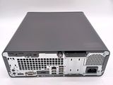 the back of a computer with a hard drive attached to it