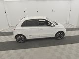 an image of a white car parked in a garage