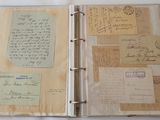 an open book with a bunch of letters on it