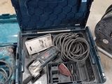 a tool box with tools in it sitting on the floor