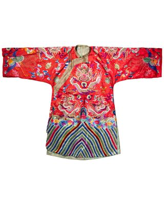 a red jacket with a dragon and flowers on it