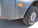 a close up of a truck tire on the road