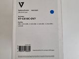 a box of blue ink sitting on top of a white table