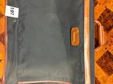a piece of luggage that is sitting on top of a table