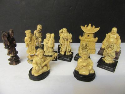 a lot of chess pieces that are sitting on a table