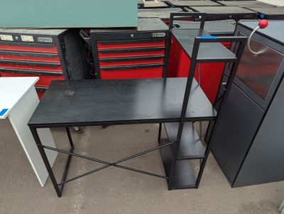 a lot of desks and cabinets in the garage