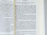 an open book with a picture of a cat on it
