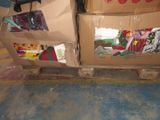 two cardboard boxes stacked on top of each other on the floor