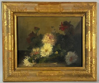 an oil painting of flowers in a gold frame on a table