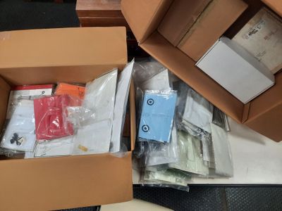 two boxes of electronic equipment sitting on a table