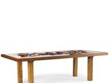 an image of a wooden table with a mosaic design on it