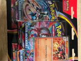 a box of pokemon cards sitting on a table