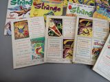 a lot of comic books on the table
