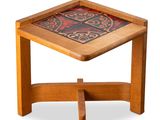 an image of a wooden table with a glass top on a white background