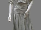 an image of a mannequin dressed in a gray dress