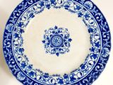 an image of a blue and white plate sitting on a table