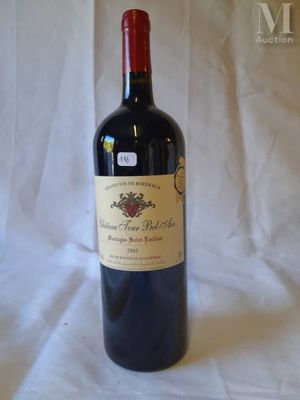 a bottle of wine that is sitting on a table