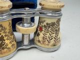 a pair of binoculars that are sitting on a table