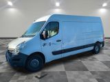 a picture of a blue van parked on a checkered floor