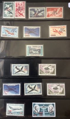 the collection of stamps are on display in a display case
