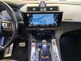a picture of a car dashboard with a navigation system
