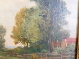 a picture of a painting of a farm scene in a gold frame