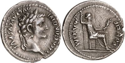 a silver coin with an image of a man and a woman on it