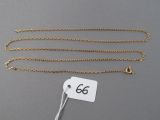 a close up of a gold chain with a price tag on it