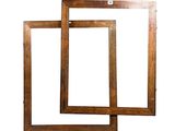 two wooden picture frames on a white background with a white background