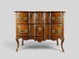 an antique chest of drawers with brass handles and drawers