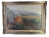 une peinture à l'huile représentant un paysage avec des balles de foin, dans un cadre doré