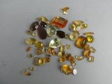 a lot of different colored stones on the table