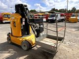 a forklift that is parked in a parking lot